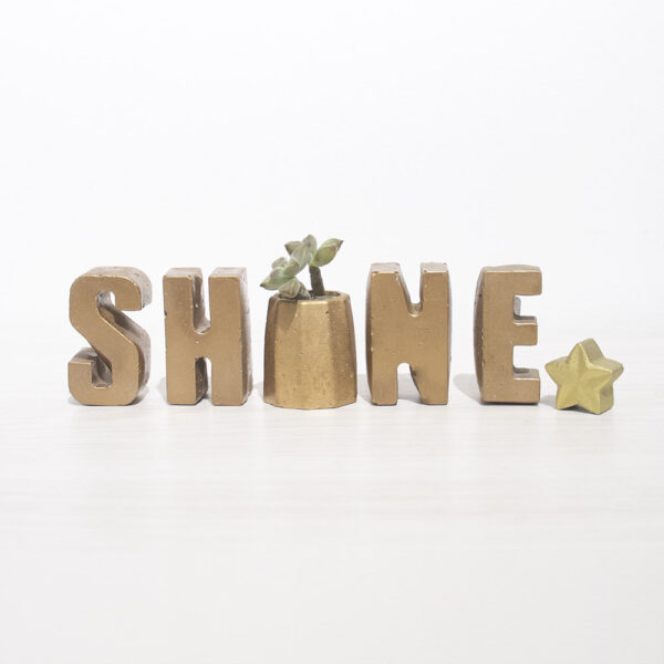 Shine en Concreto Dorado