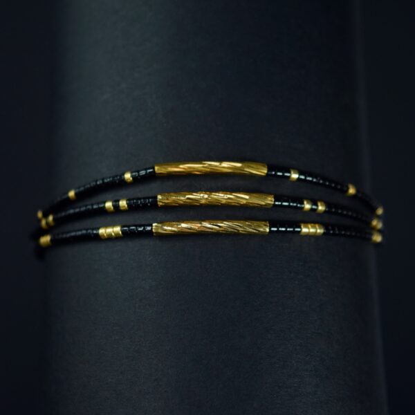 Pulsera Miyuki Triple Negra con Tubitos