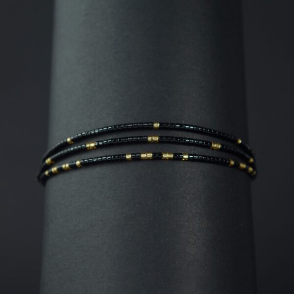 Pulsera Miyuki Triple Negros